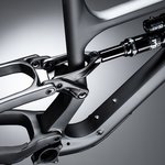 Two piece alloy links keep the suspension moving smoothly.