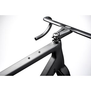 Plenty of places to store gear and water, with a multi-position mount on the downtube, and more on the top tube, seat tube, and under the down tube. There's even mounts on the forks.